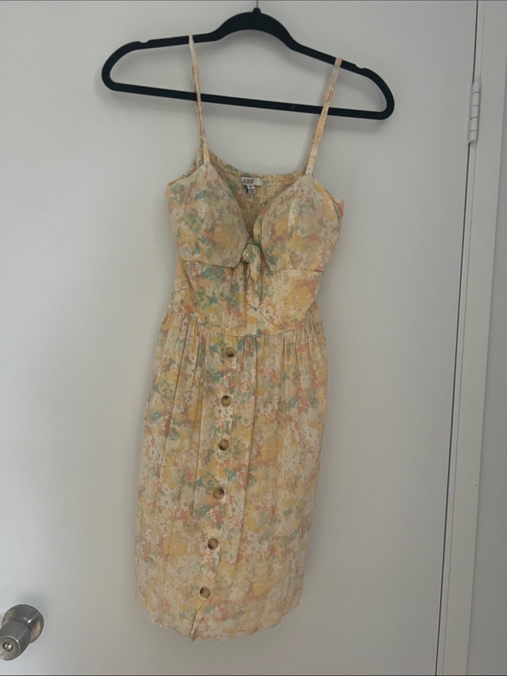 Sleeveless Floral Midi Dress with Front Buttons in Pastel Yellow